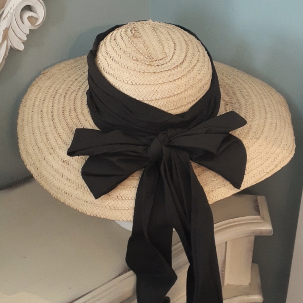 # Woven natural straw brimmed sunhat with bow